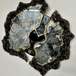 : Handmade decorative resin wall clock with a unique artistic design for modern home décor.